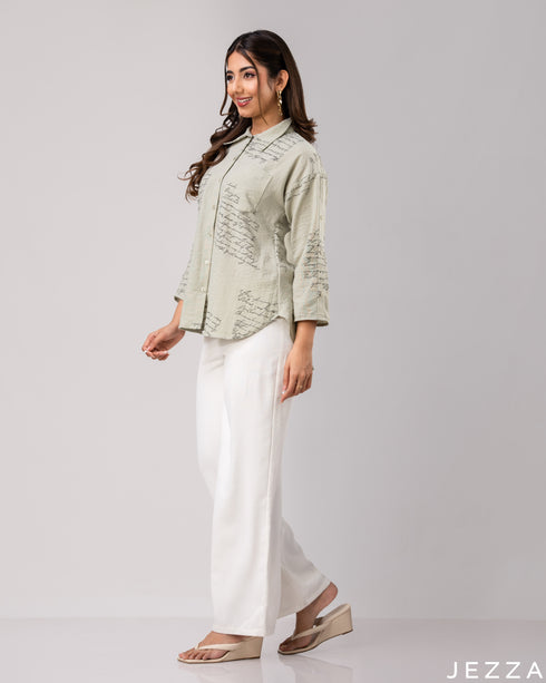 Graphic Ease: Light Green & Black Collared Hip Top 72411